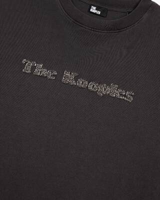 T-shirt with faded black logo