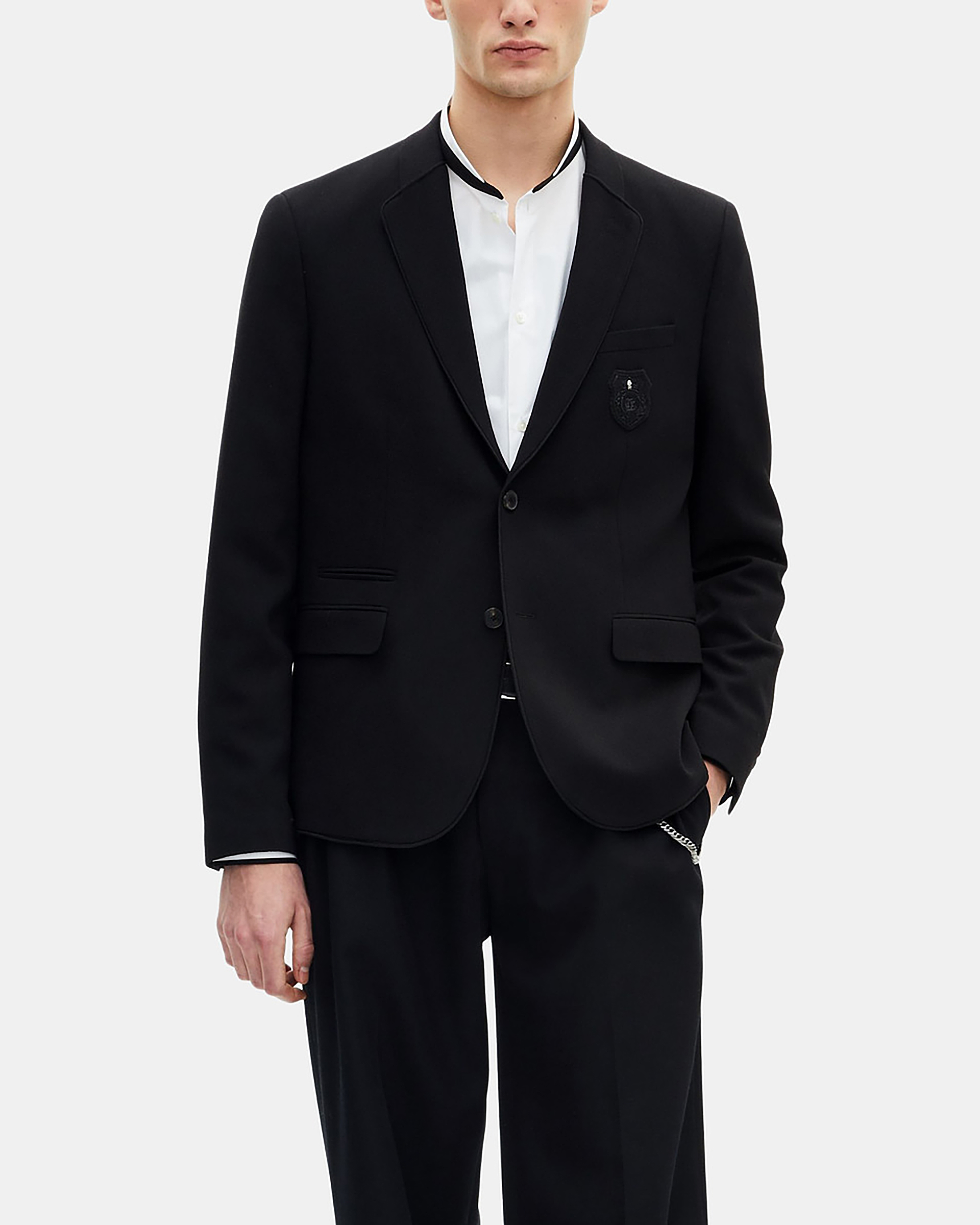 Straight jacket in black pique wool