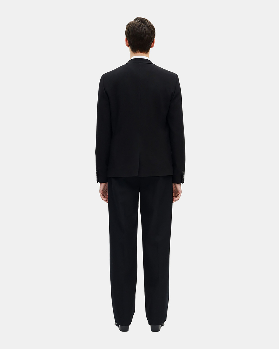 Straight jacket in black pique wool