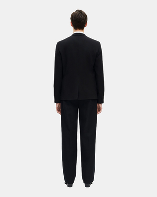 Straight jacket in black pique wool