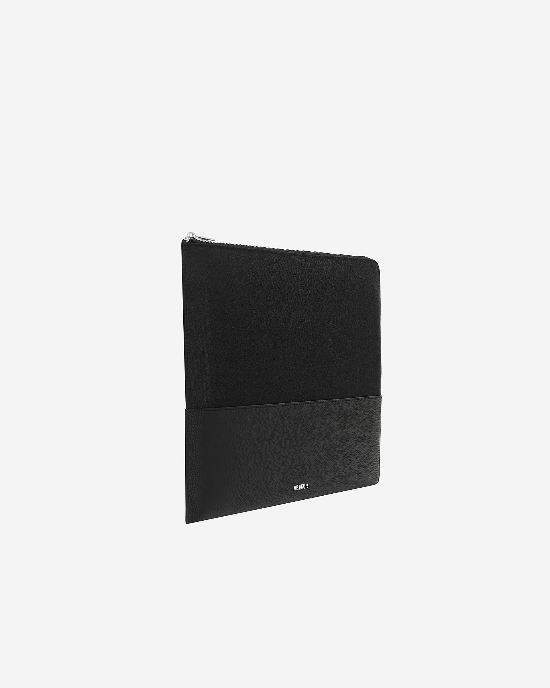 Black canvas and grained leather computer case