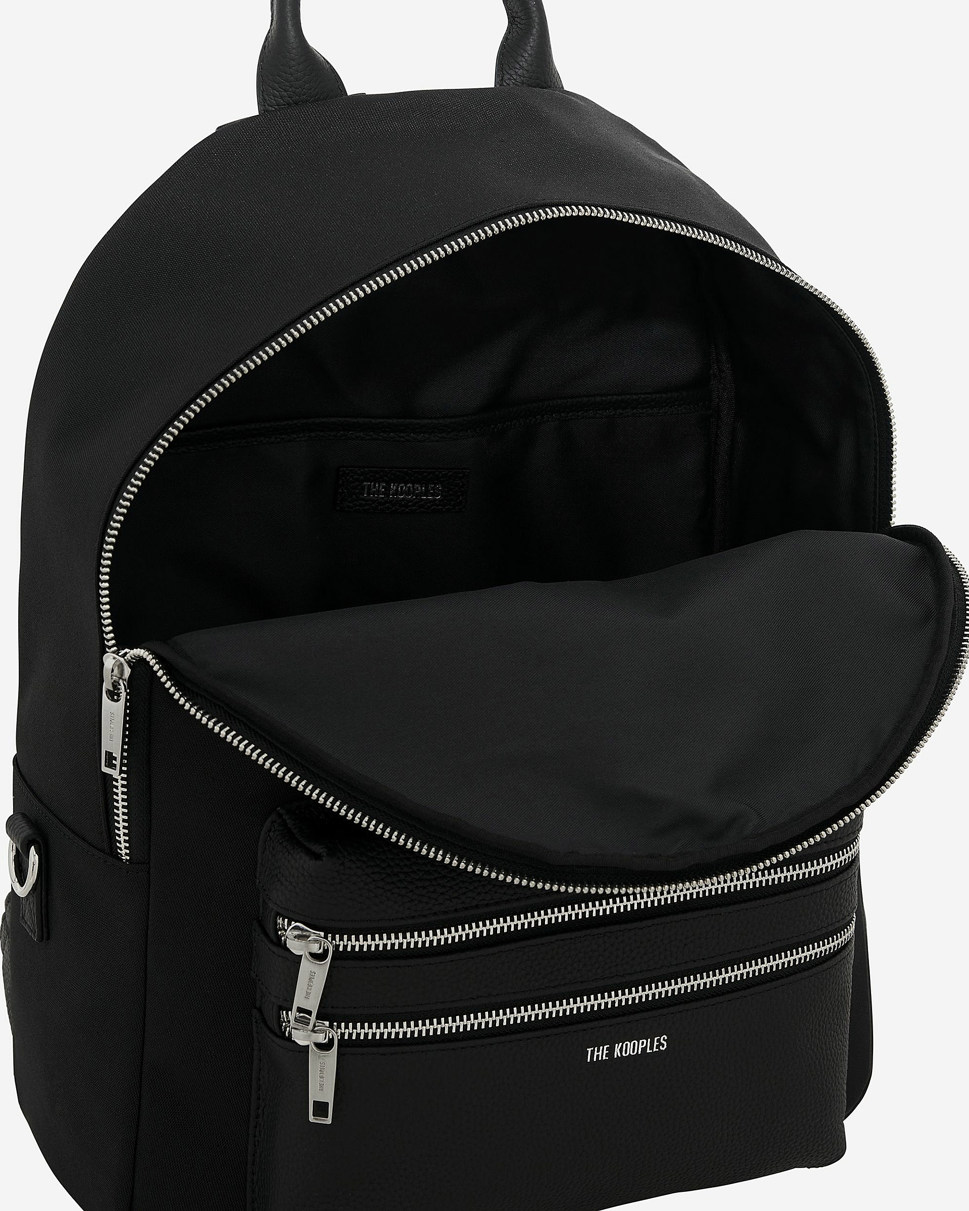 Black canvas and grained leather backpack