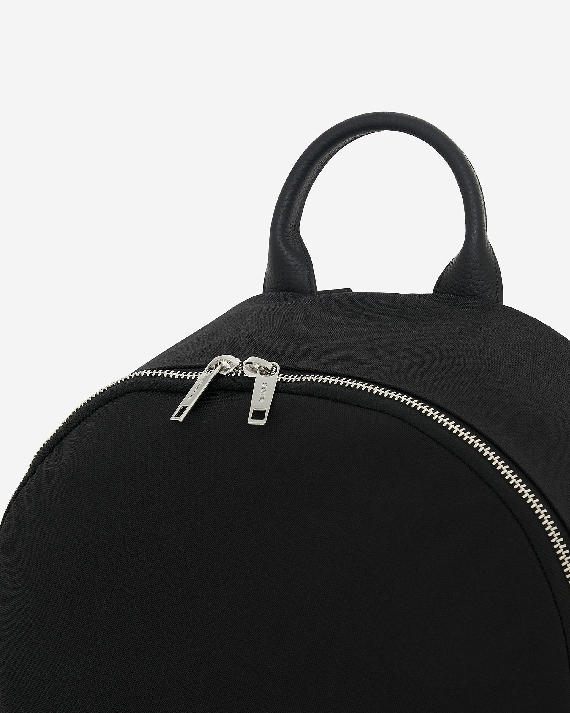 Black canvas and grained leather backpack