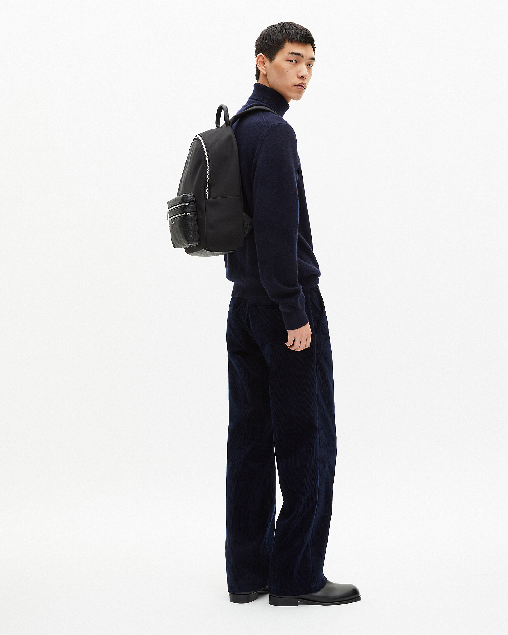 Black canvas and grained leather backpack