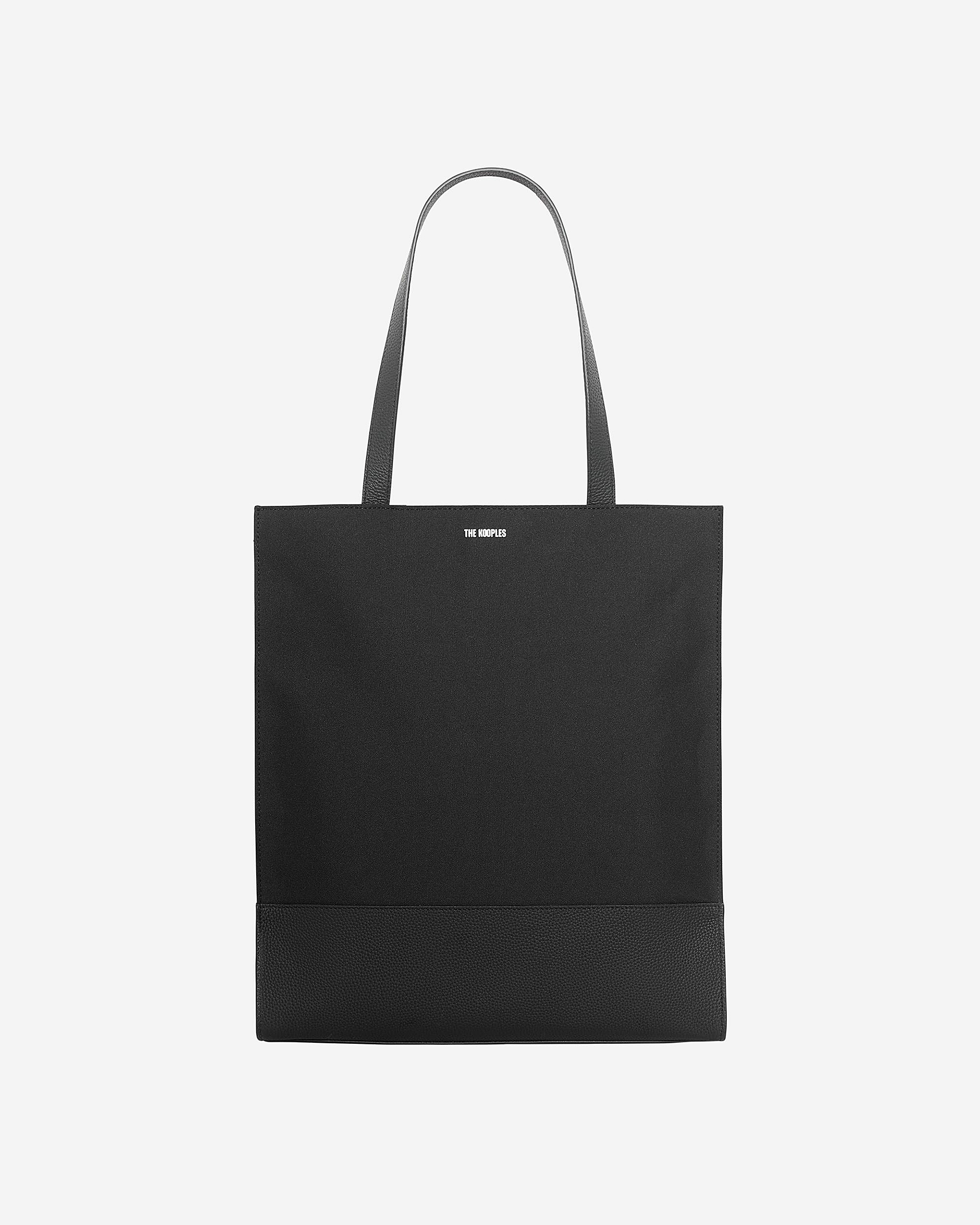 Black canvas and grained leather tote bag