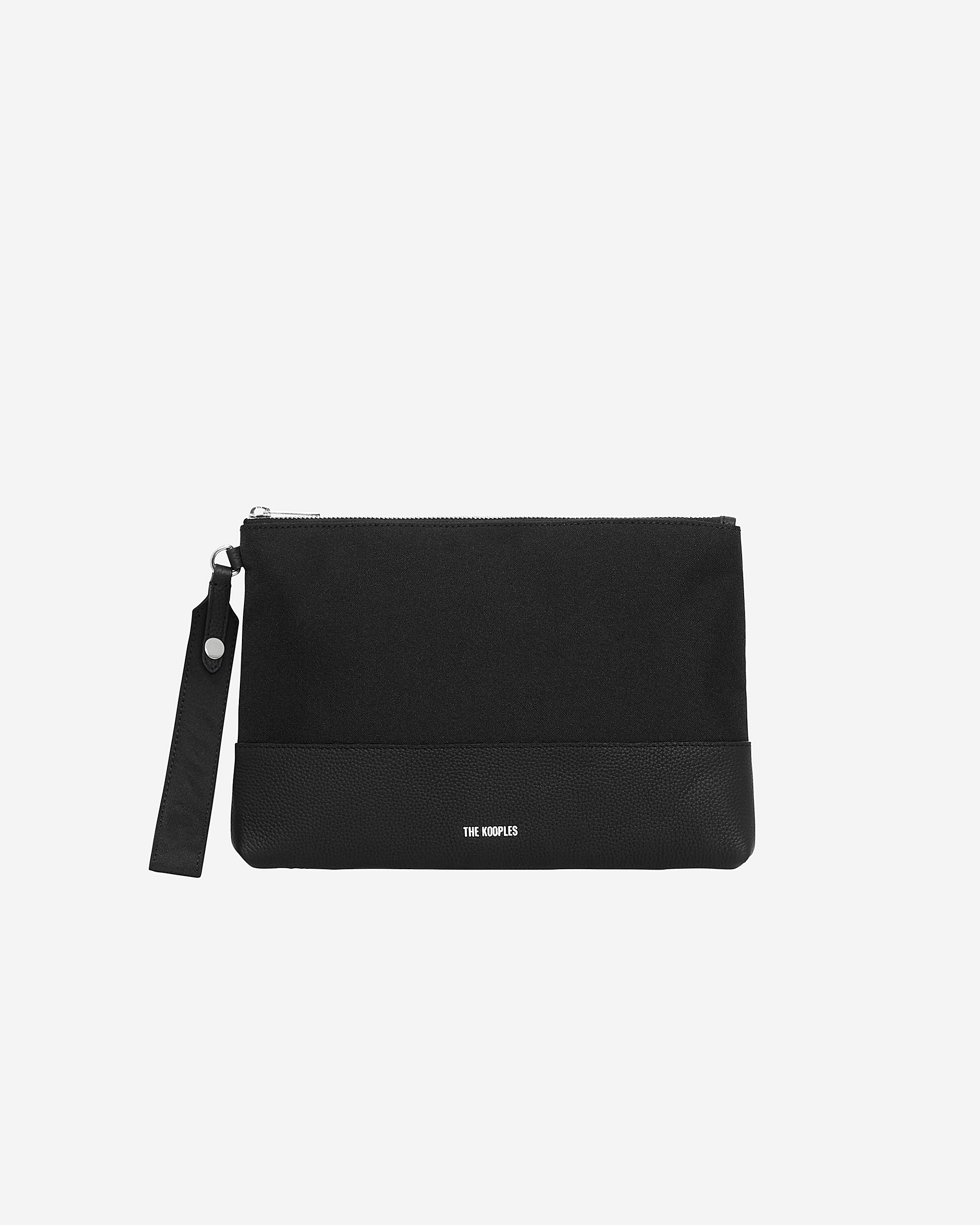 Black canvas and grained leather travel pouch