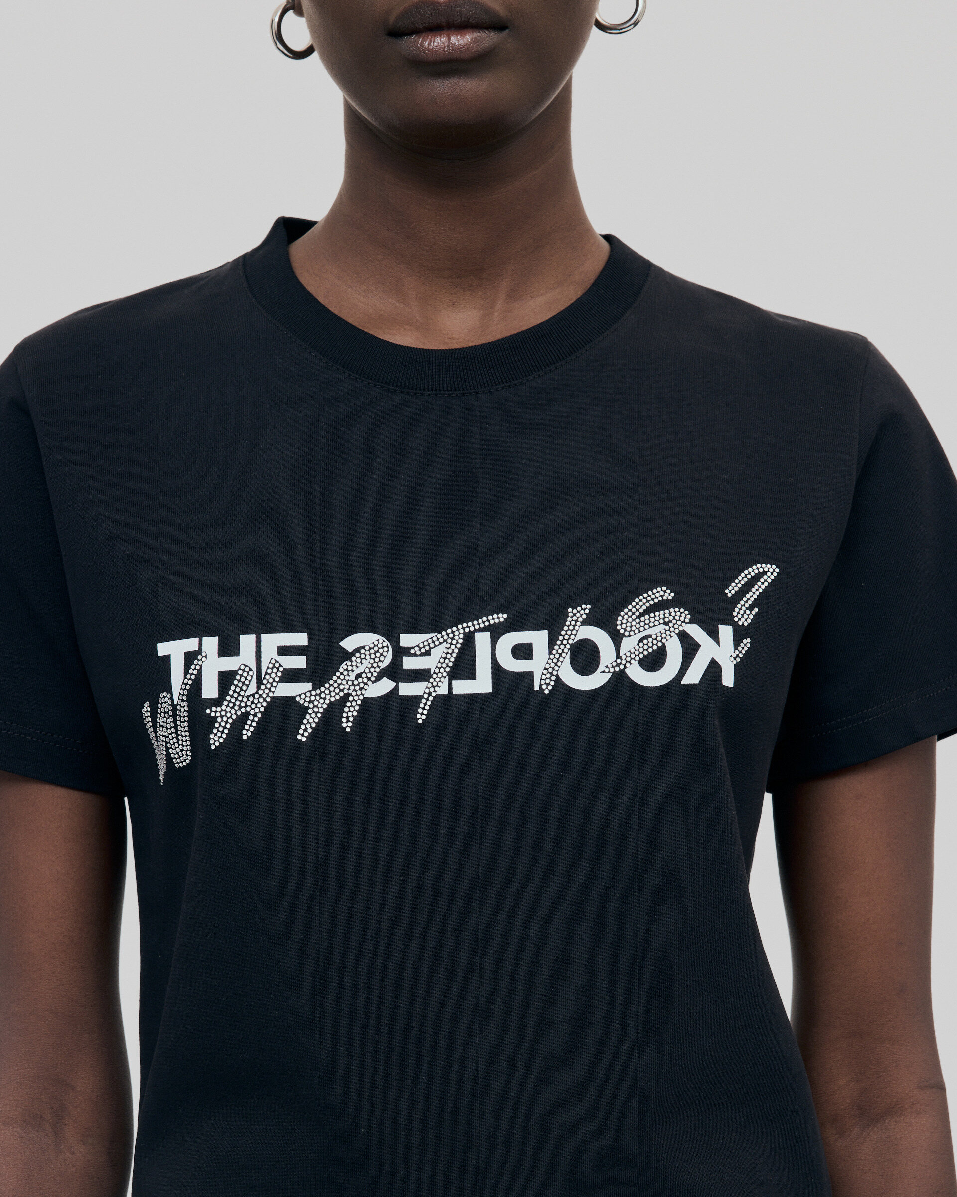 'What Is' T-shirt with black rhinestones