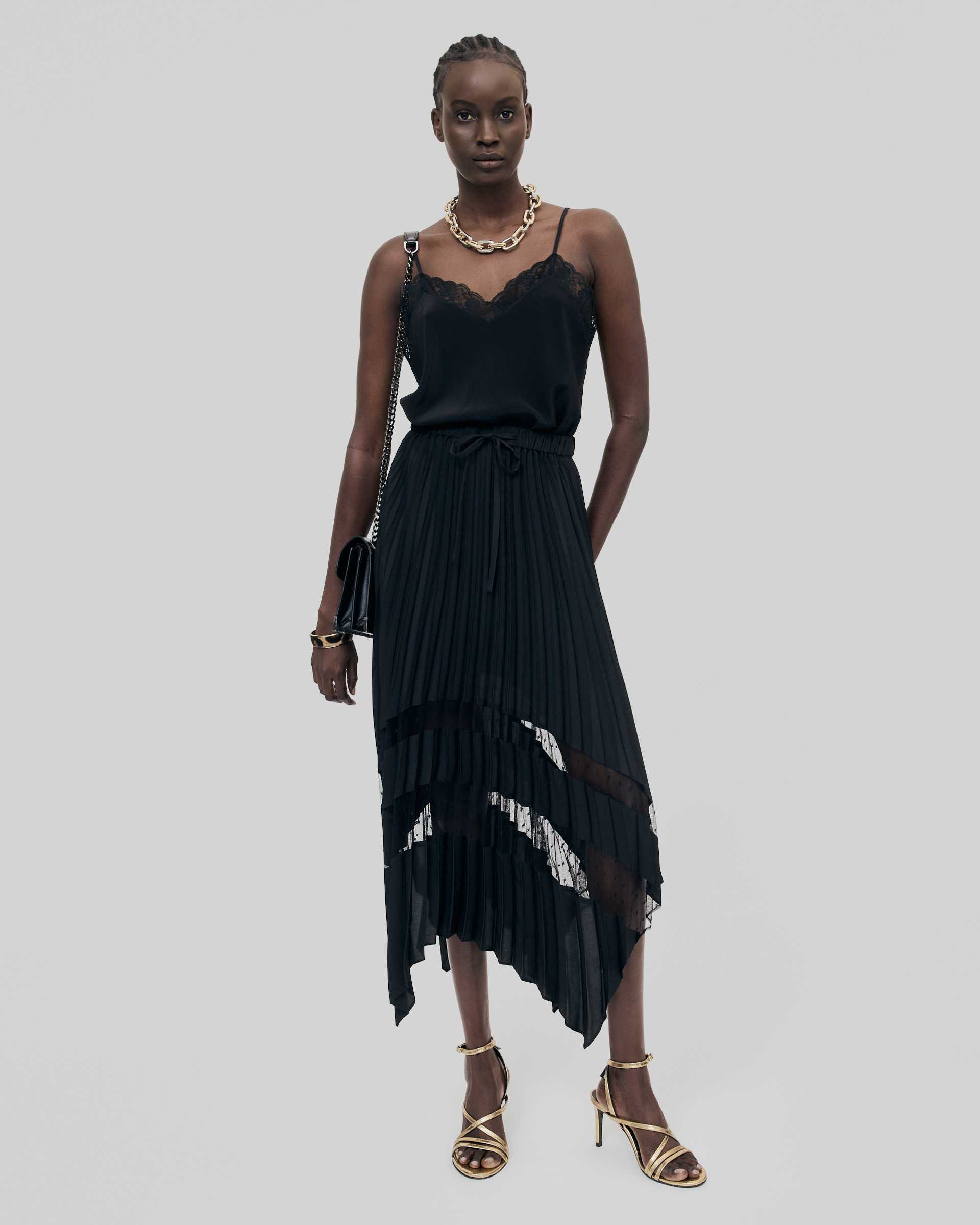 Long pleated skirt with black lace