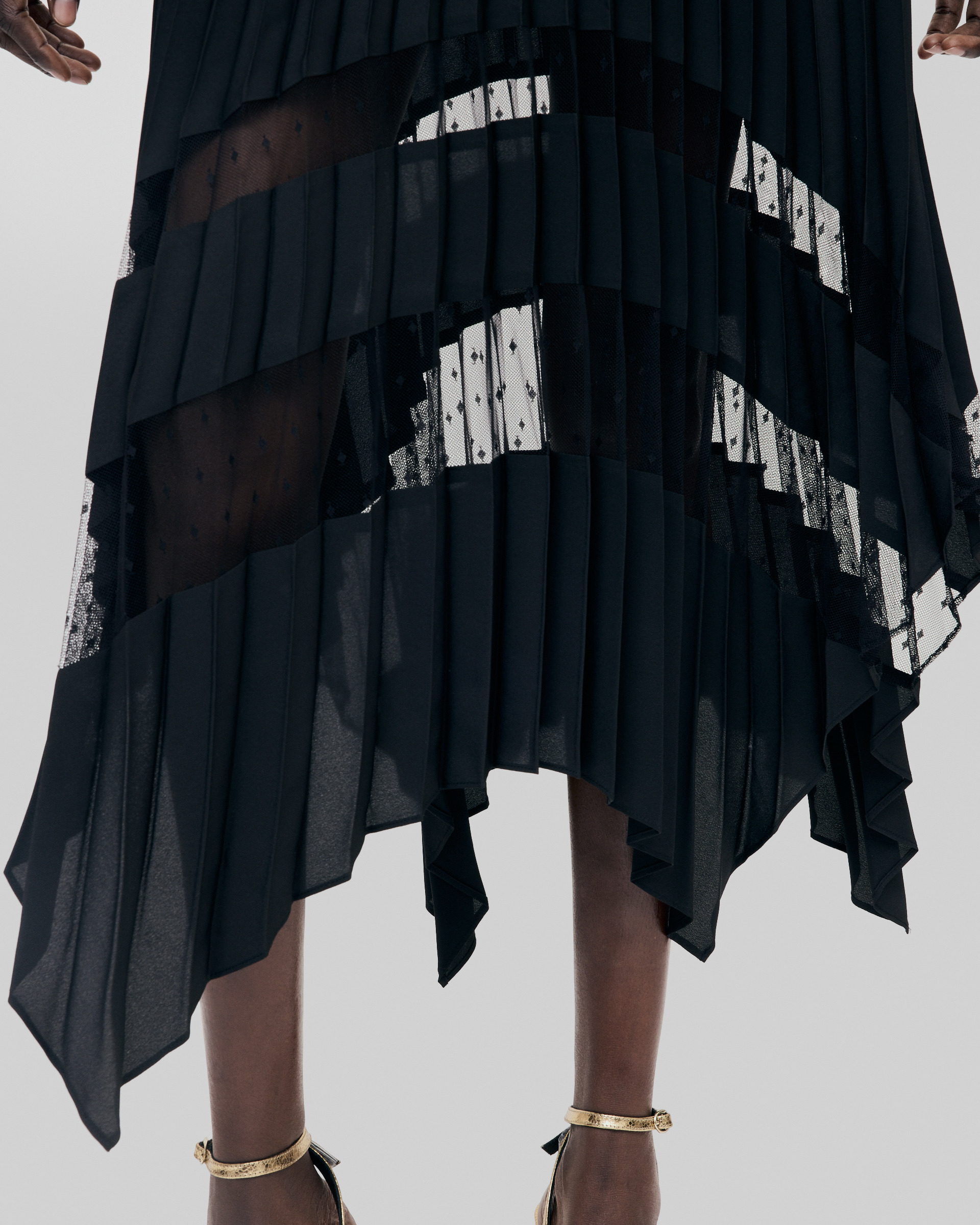Long pleated skirt with black lace