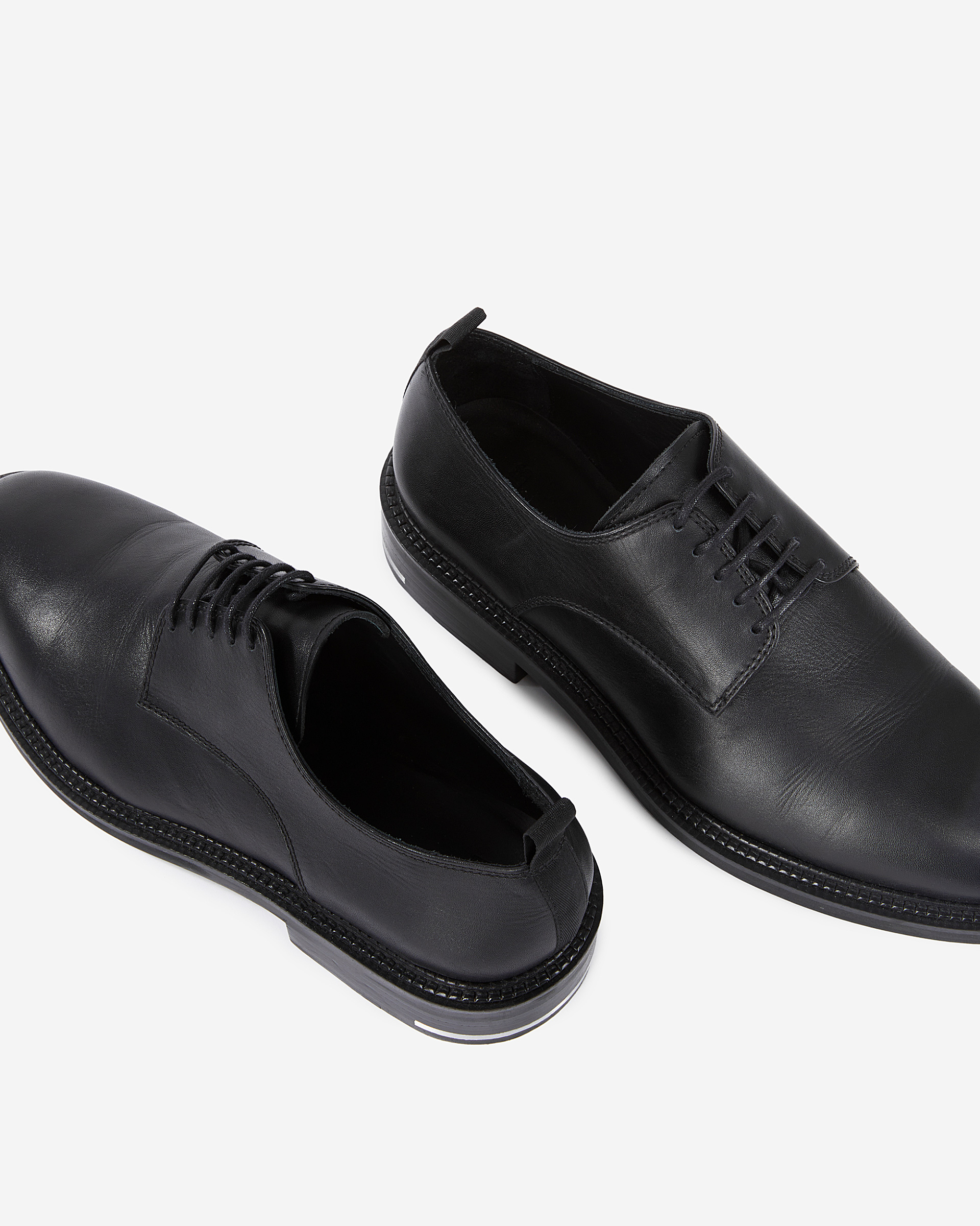 Black leather lace-up shoes