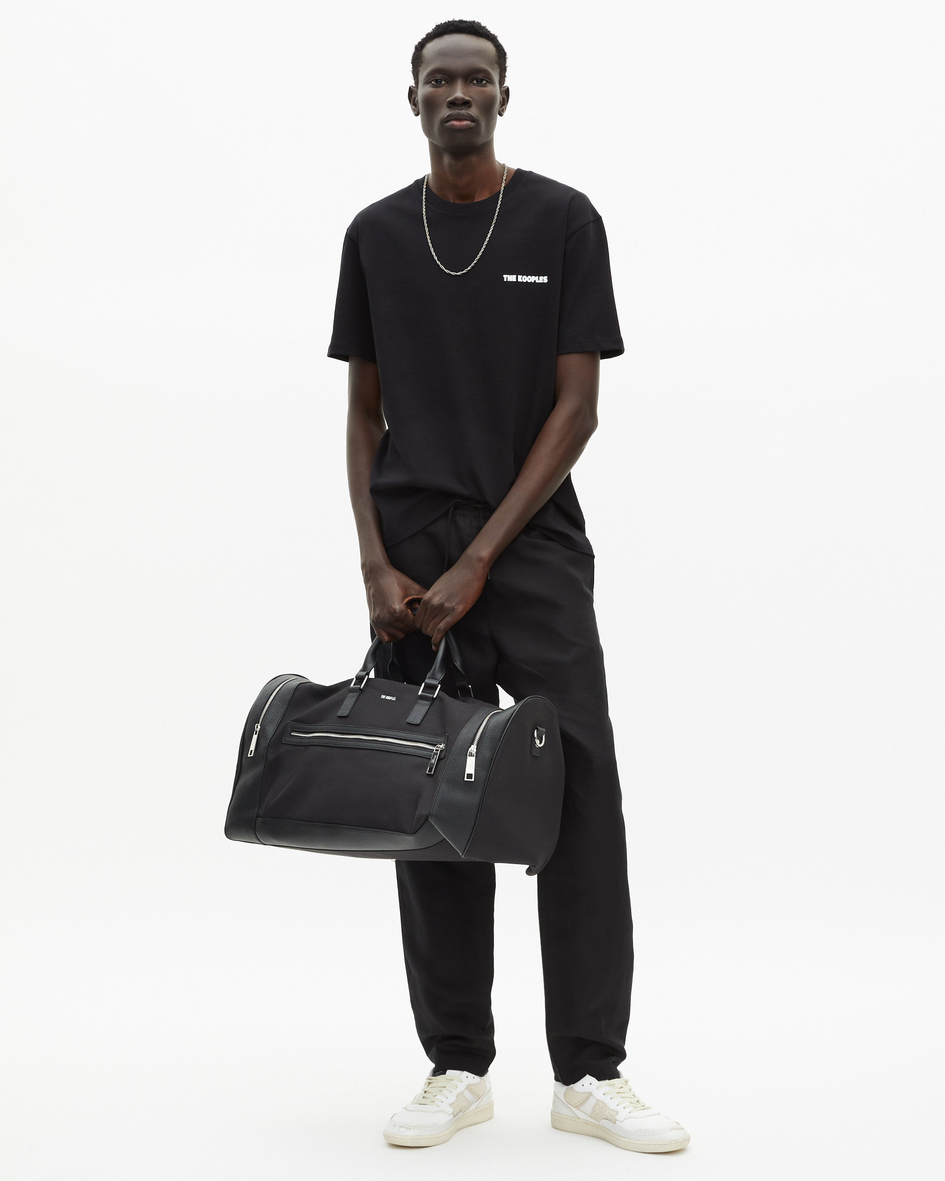Black leather and canvas weekend bag