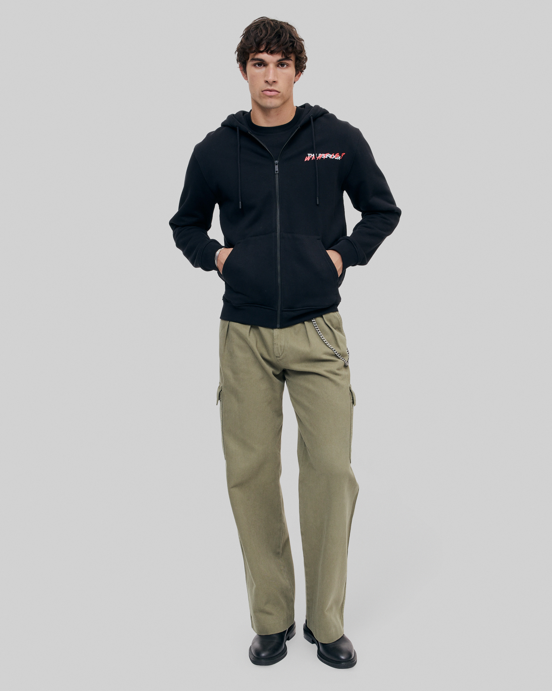 What Is Black Hooded Zip-Up Sweatshirt