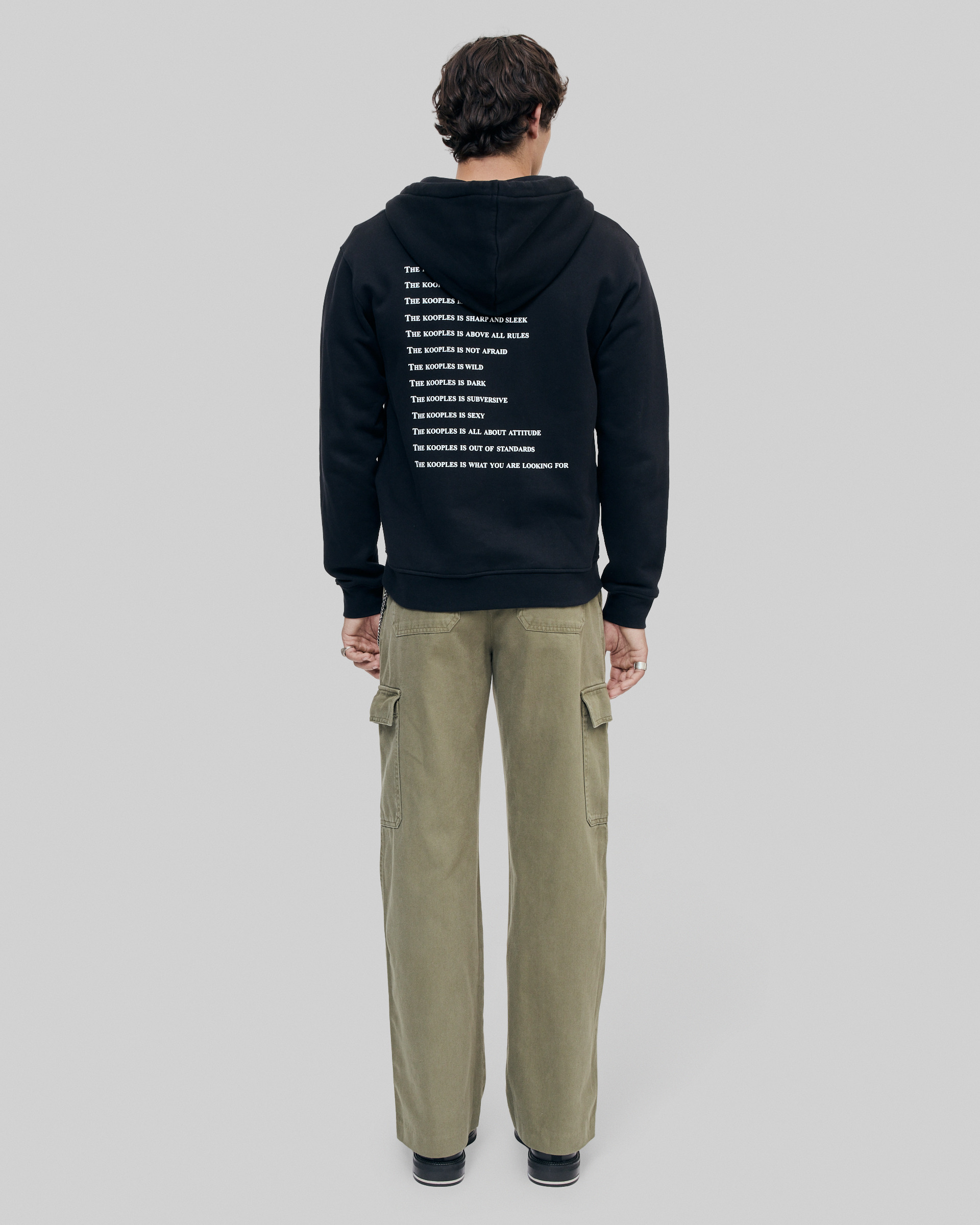 What Is Black Hooded Zip-Up Sweatshirt