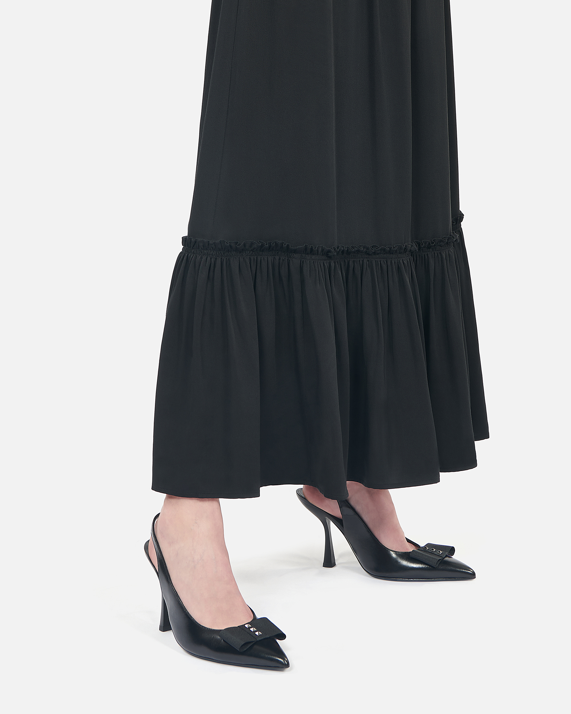 Black leather slingback pumps