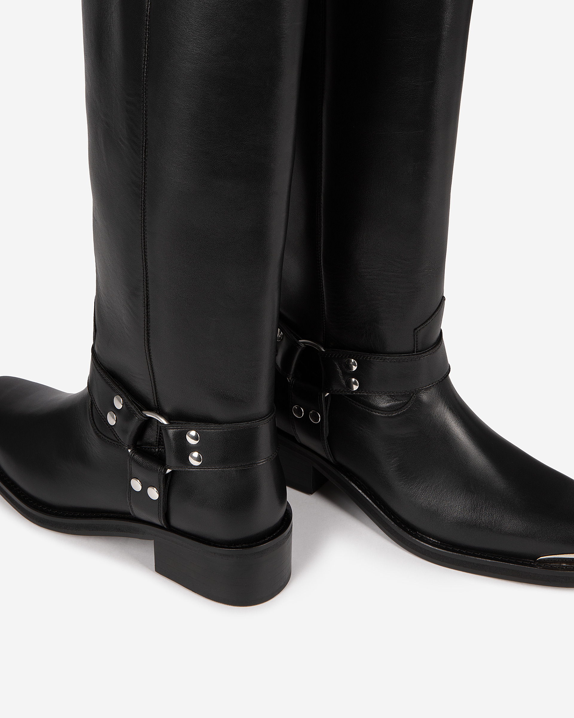 Black leather strap boots