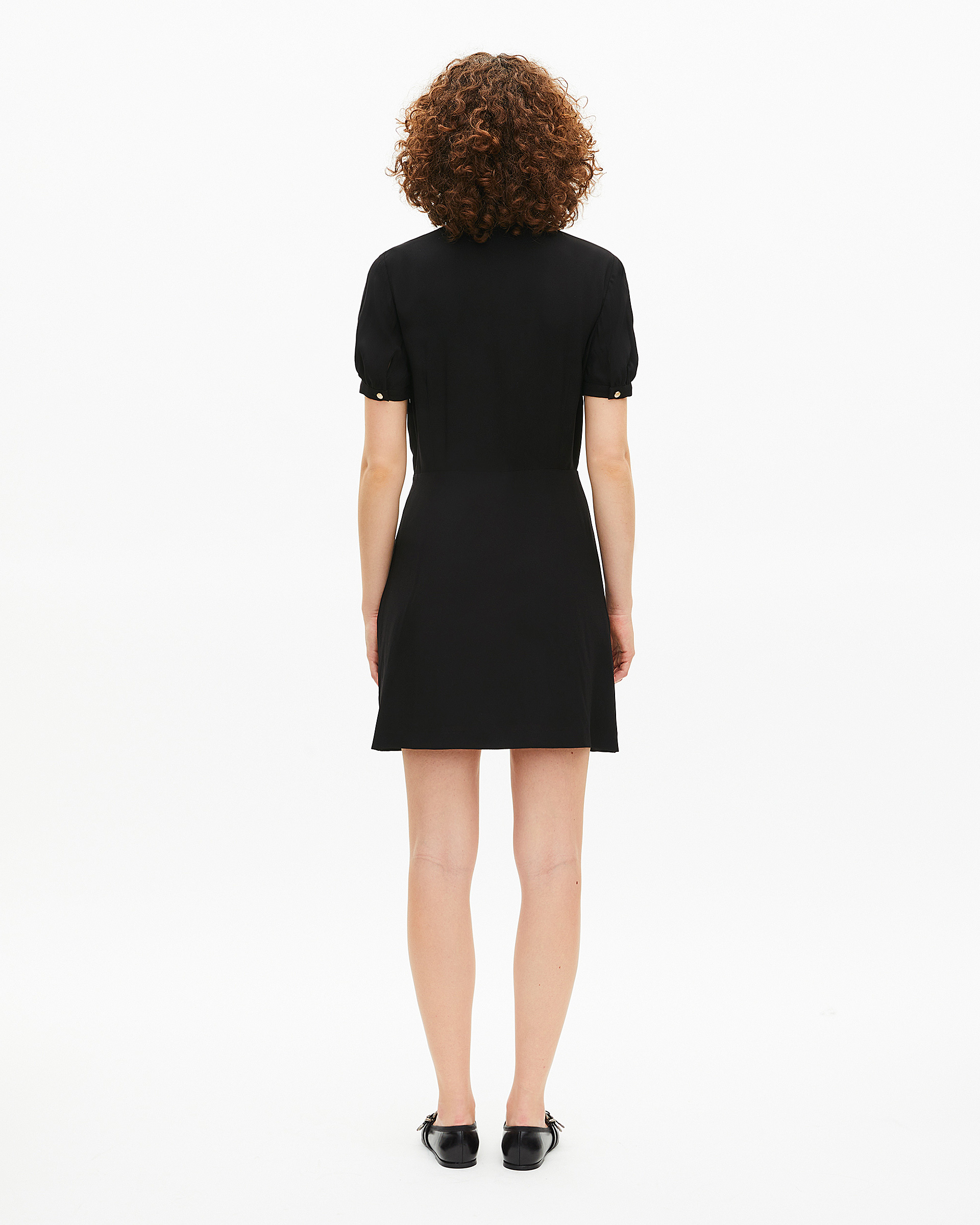 Short black dress with contrasting embroidered collar