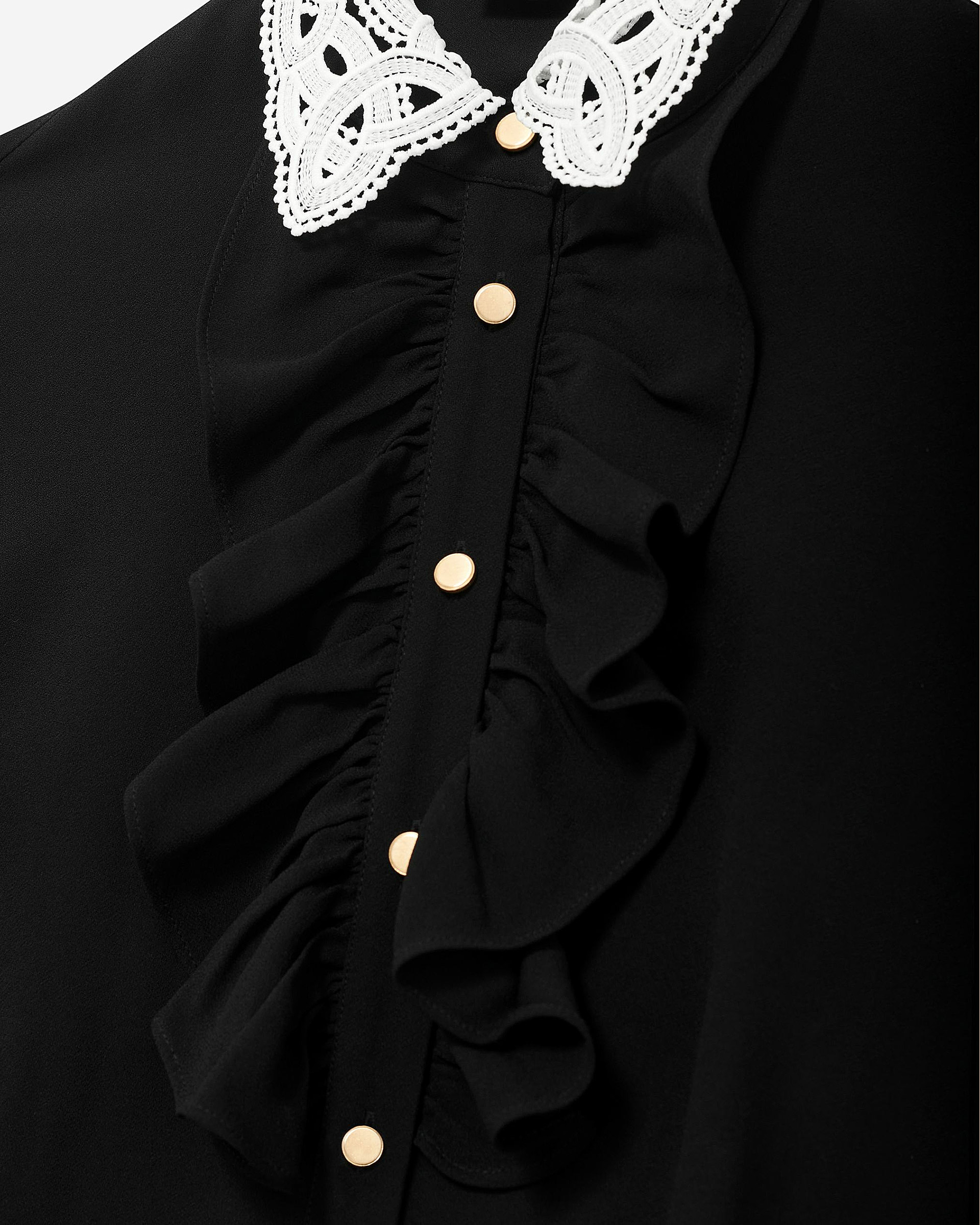 Short black dress with contrasting embroidered collar