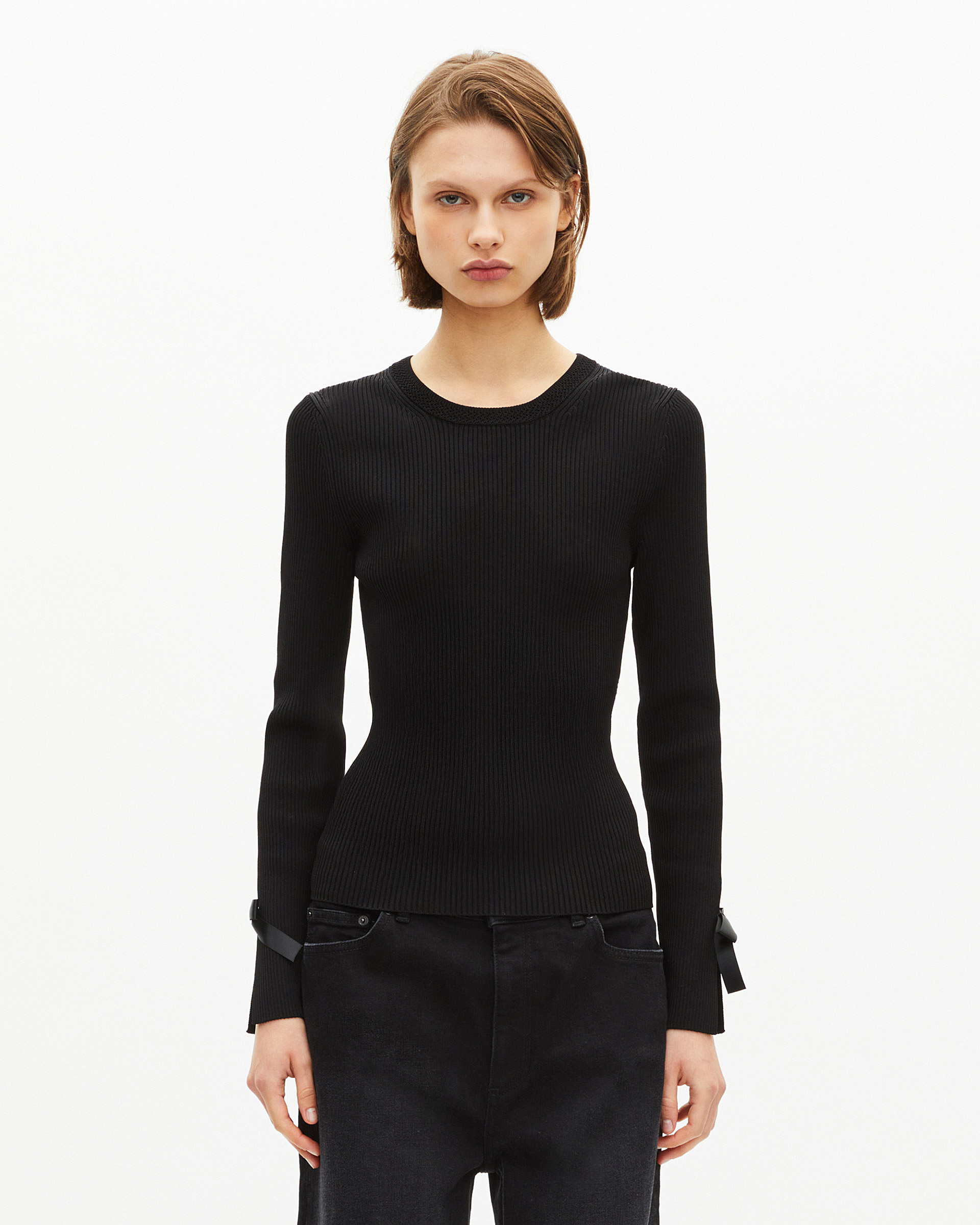 Sweater with black ribbons