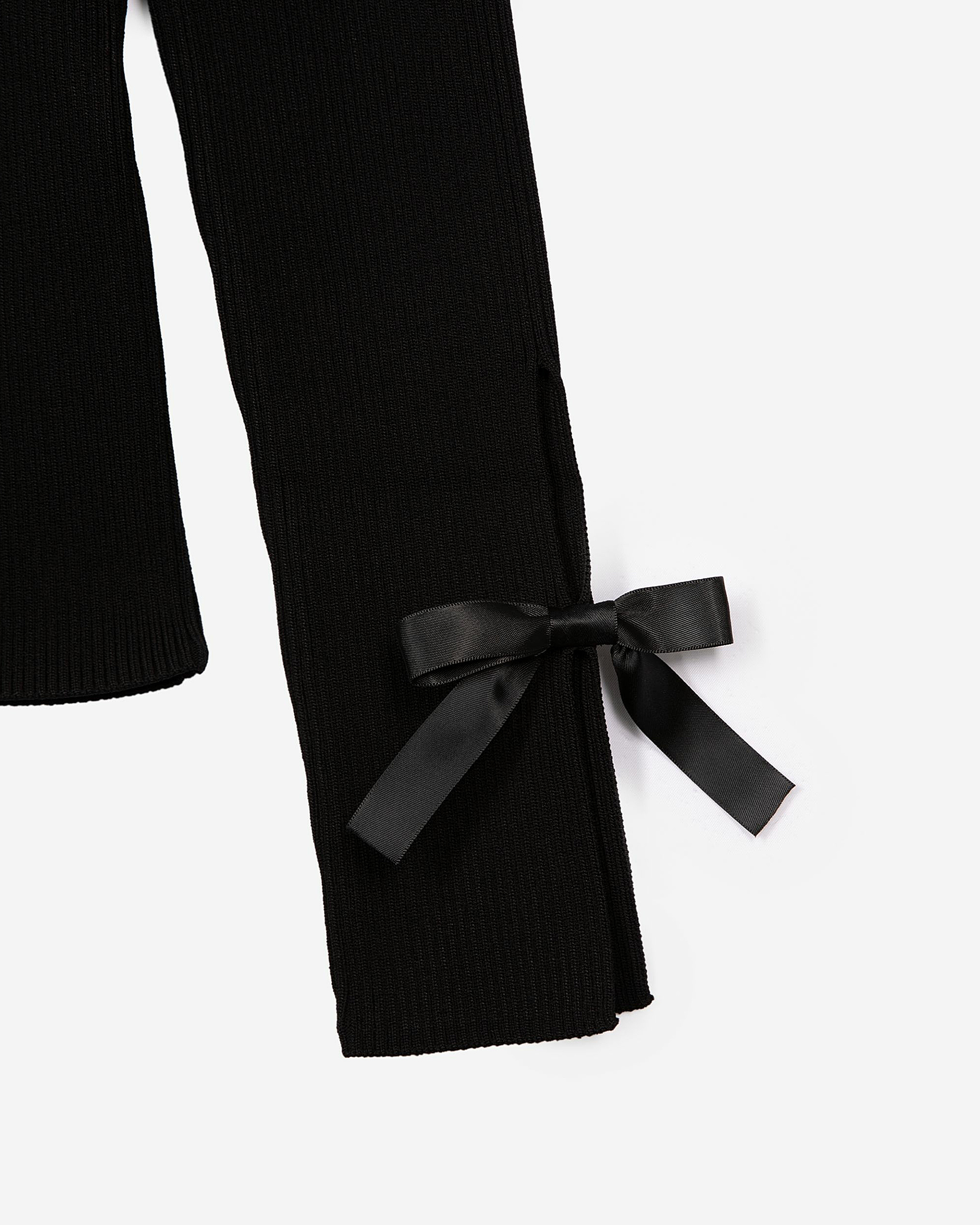 Sweater with black ribbons
