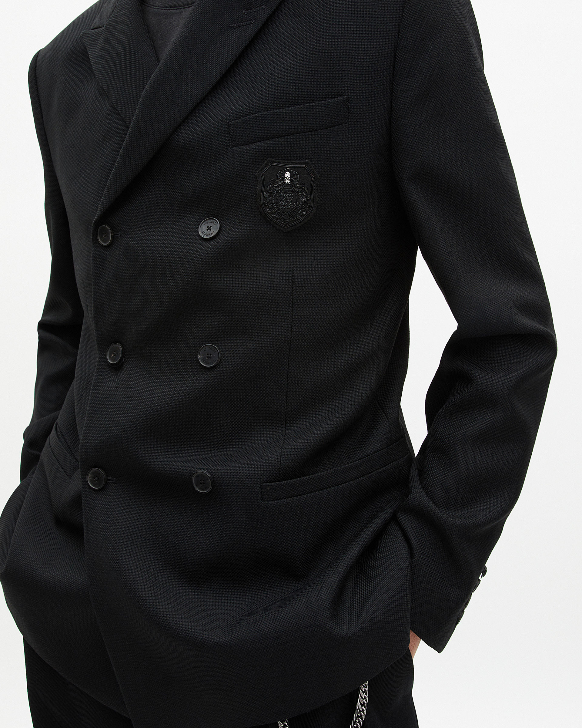 Double-breasted straight jacket with black crest
