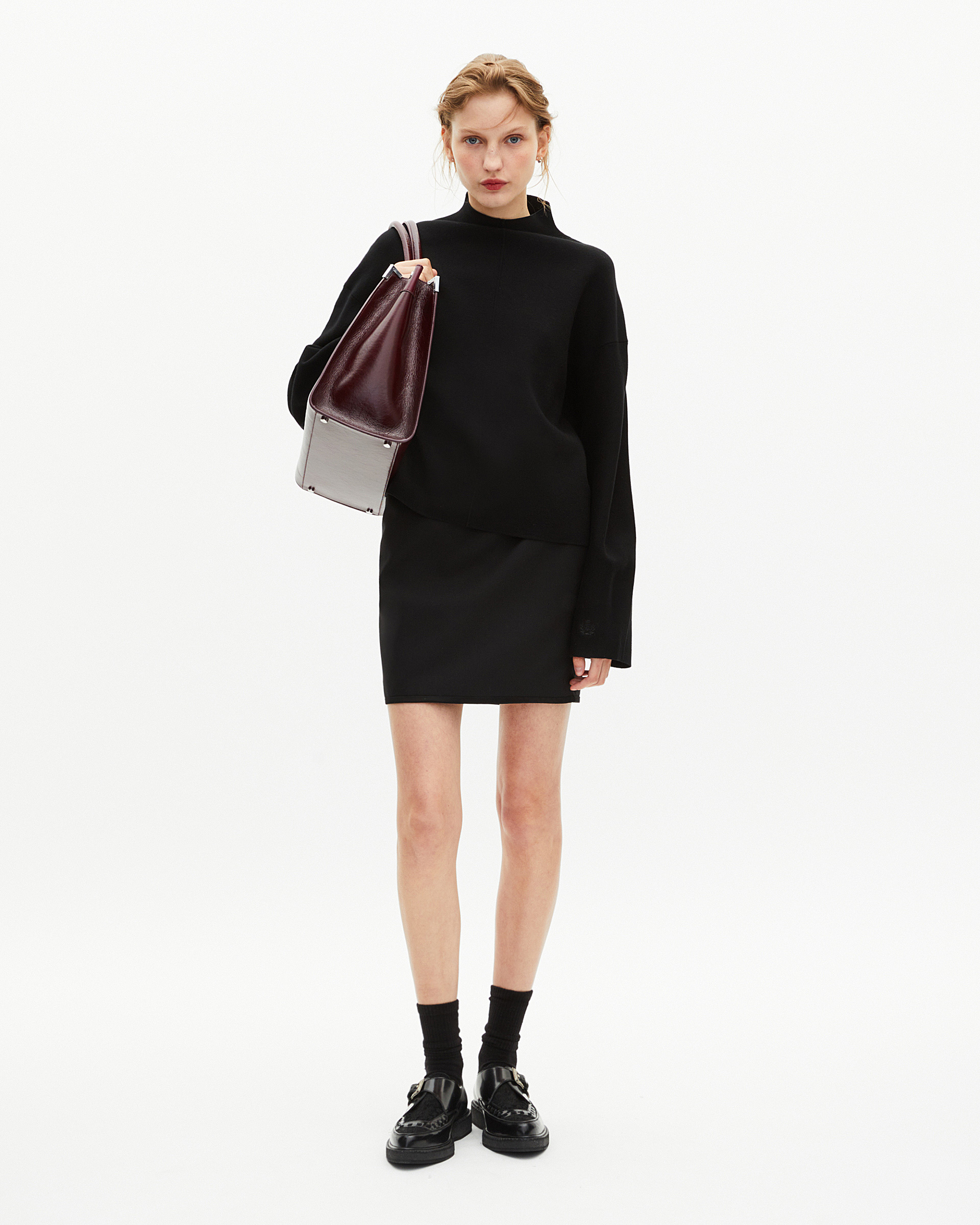 Black mock-neck sweater