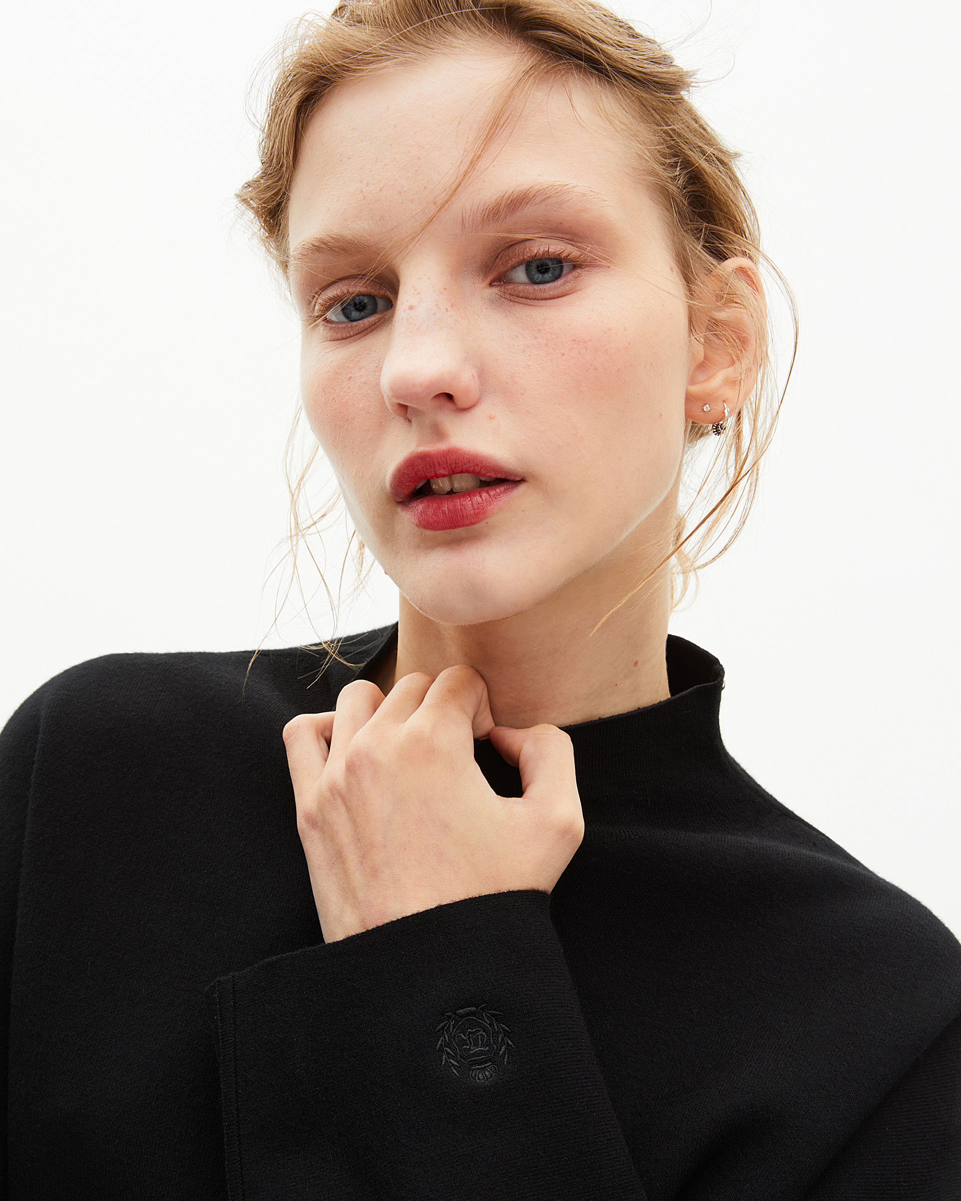 Black mock-neck sweater