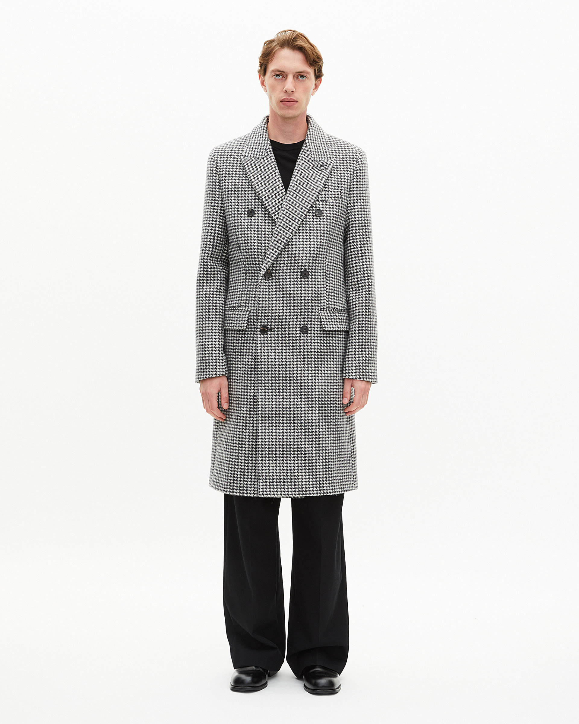 Long black and white wool houndstooth coat
