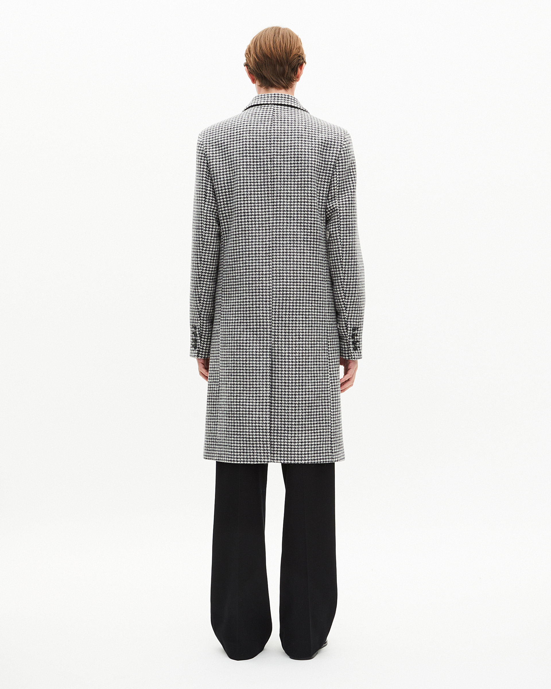 Long black and white wool houndstooth coat