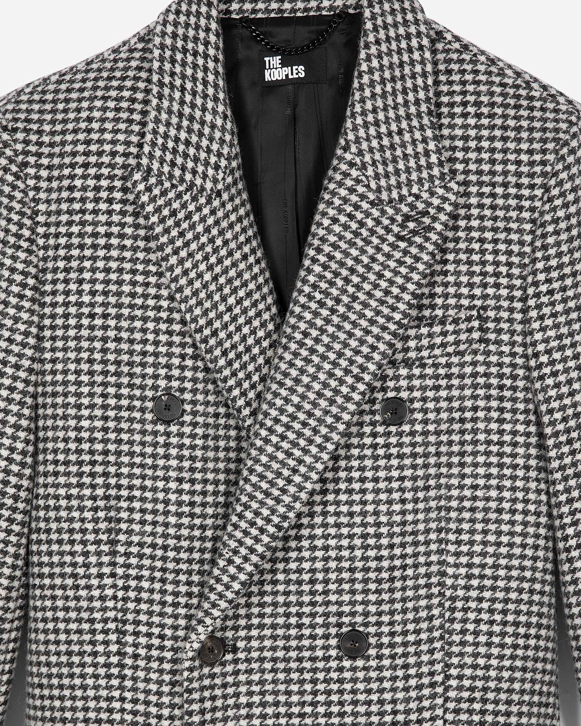 Long black and white wool houndstooth coat