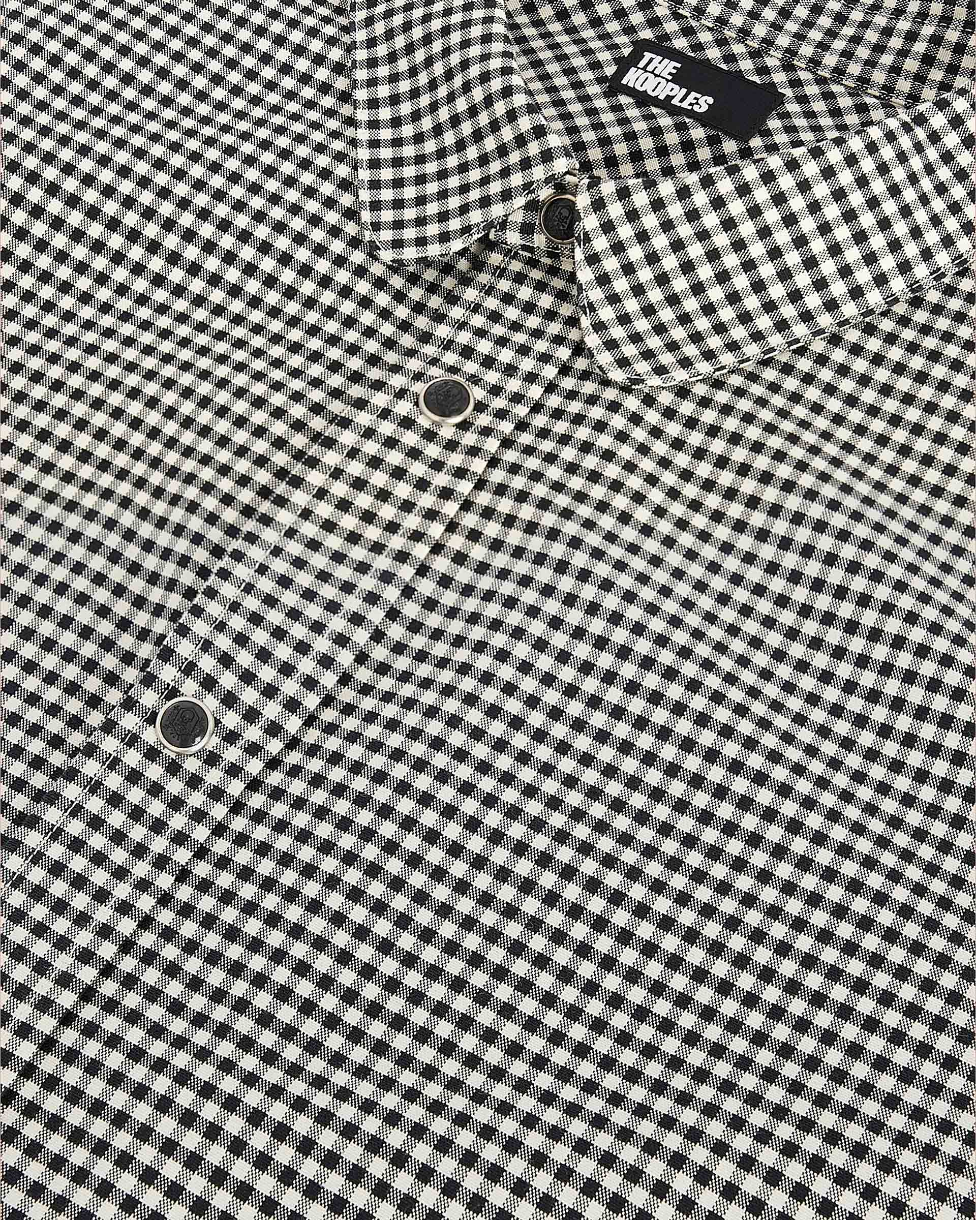 White and black checkered shirt