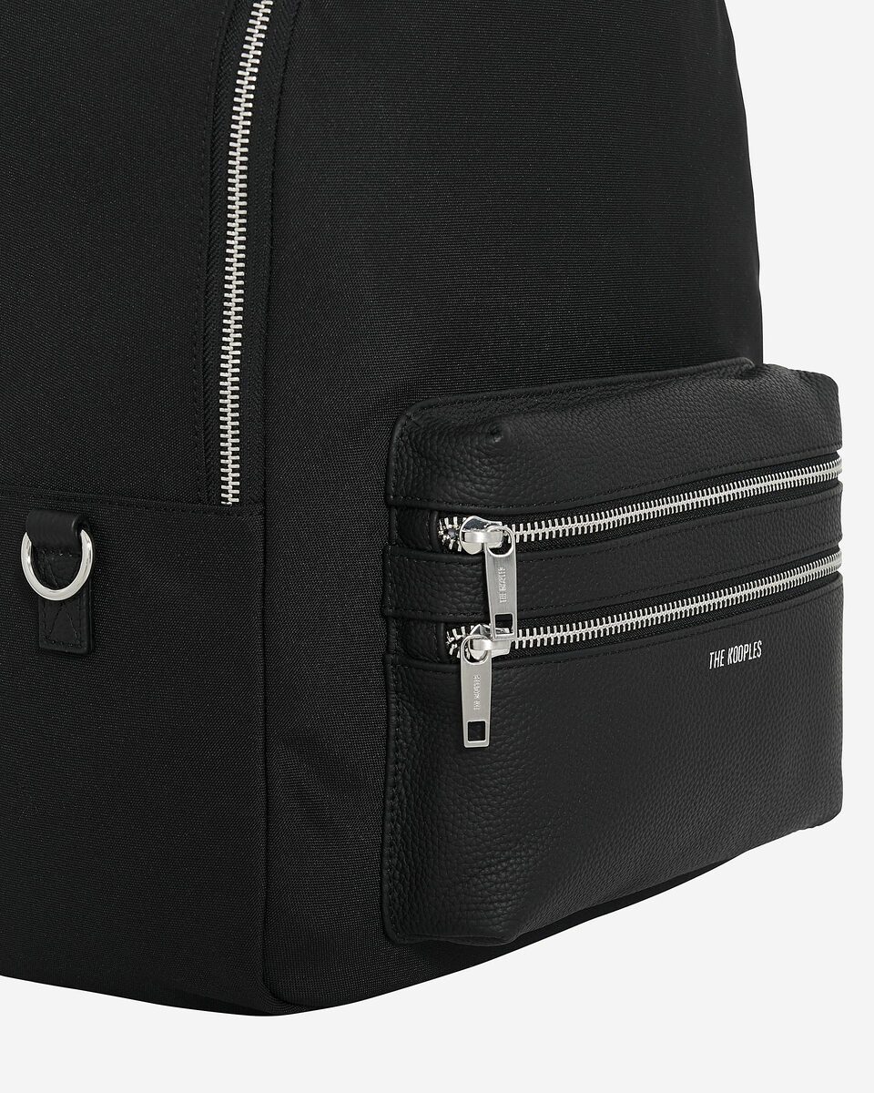 Black canvas and grained leather backpack