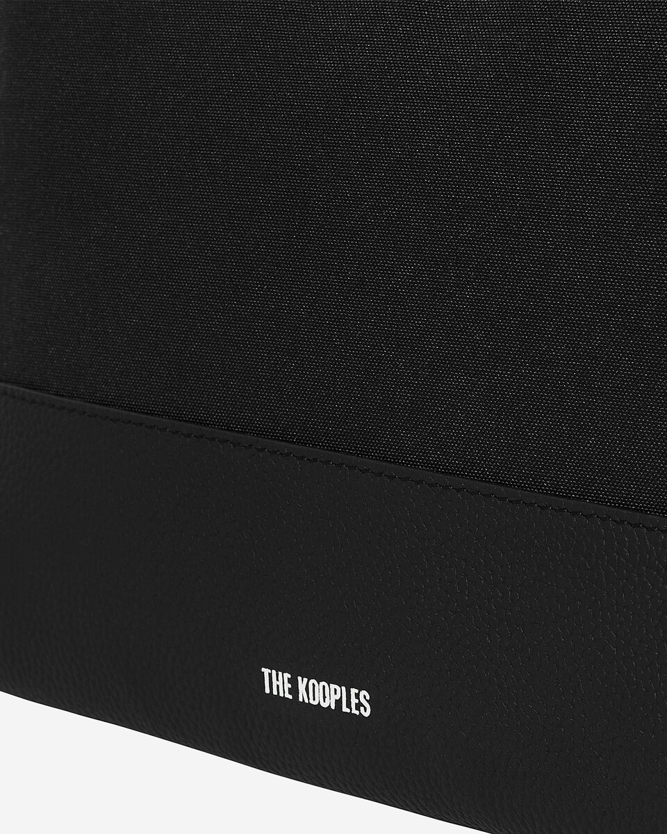 Black canvas and grained leather travel pouch