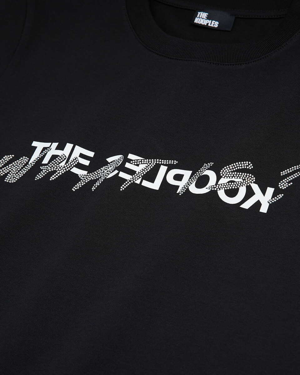 'What Is' T-shirt with black rhinestones