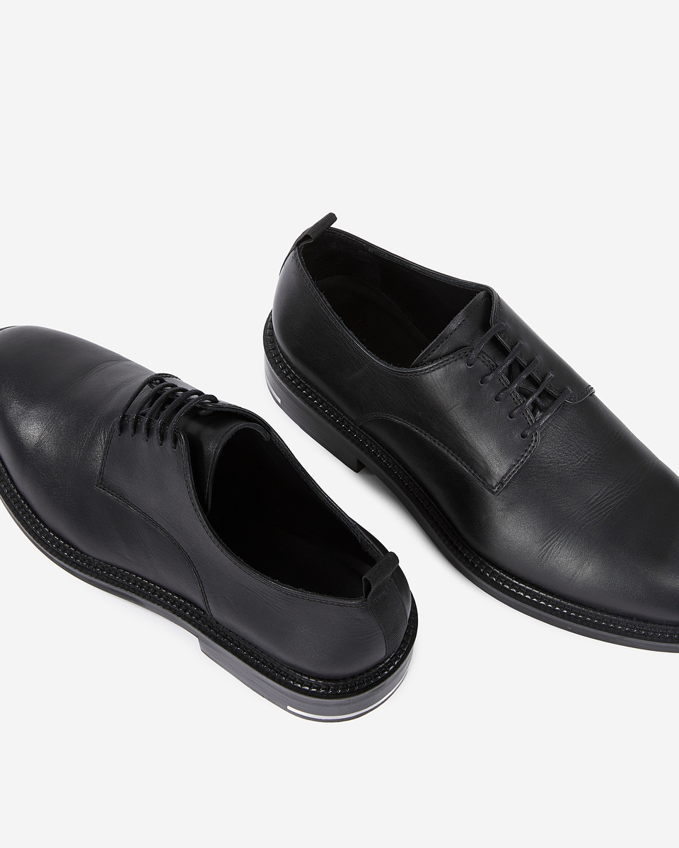 Black leather lace-up shoes