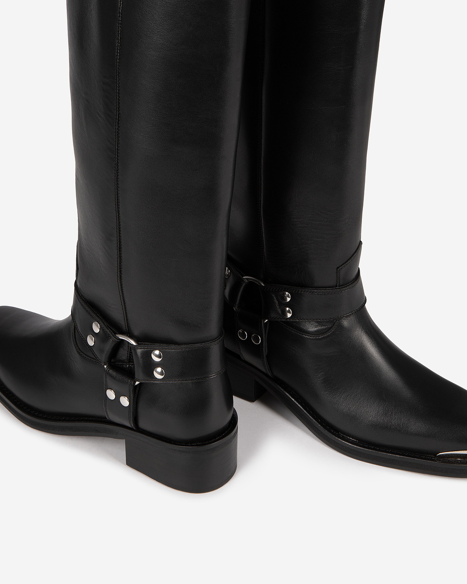 Black leather strap boots