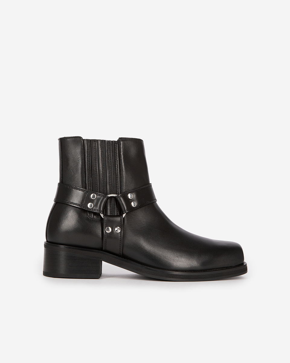 Black leather ankle boots with straps