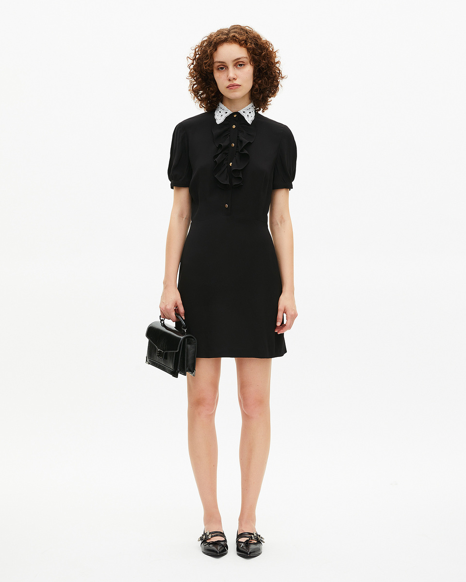 Short black dress with contrasting embroidered collar