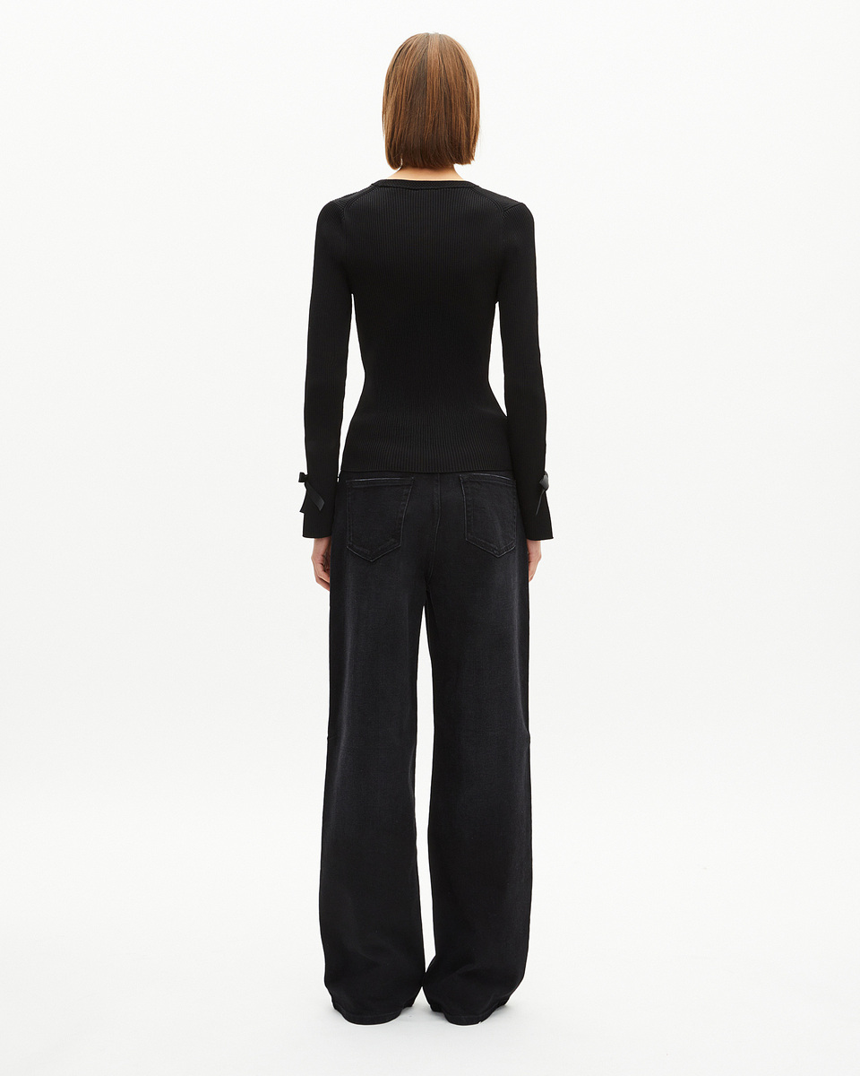 Sweater with black ribbons