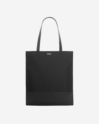 Black canvas and grained leather tote bag