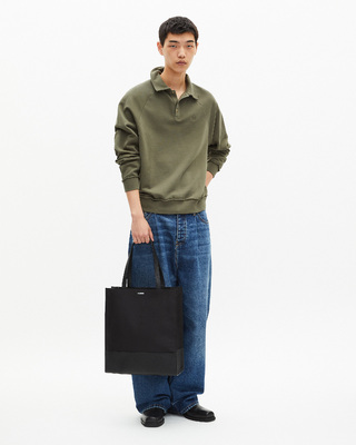 Black canvas and grained leather tote bag