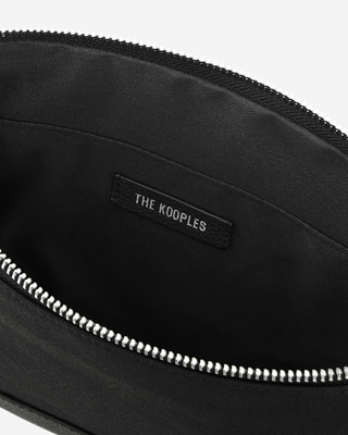Black canvas and grained leather travel pouch