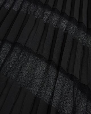 Long pleated skirt with black lace