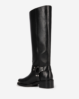 Black leather strap boots