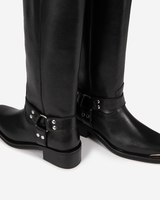 Black leather strap boots