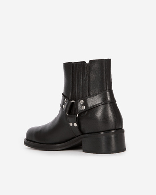 Black leather ankle boots with straps