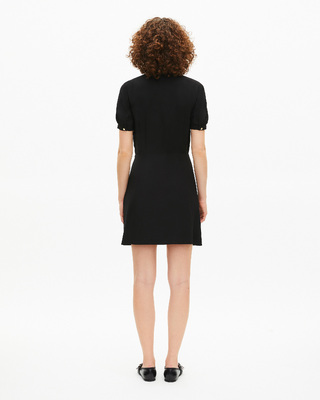 Short black dress with contrasting embroidered collar