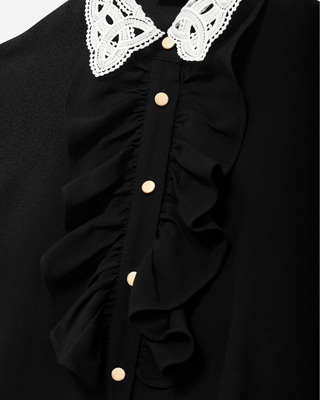 Short black dress with contrasting embroidered collar