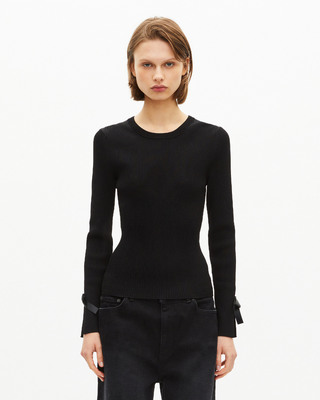 Sweater with black ribbons