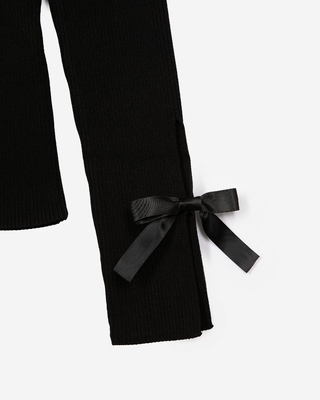 Sweater with black ribbons