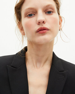 Short asymmetrical black jacket